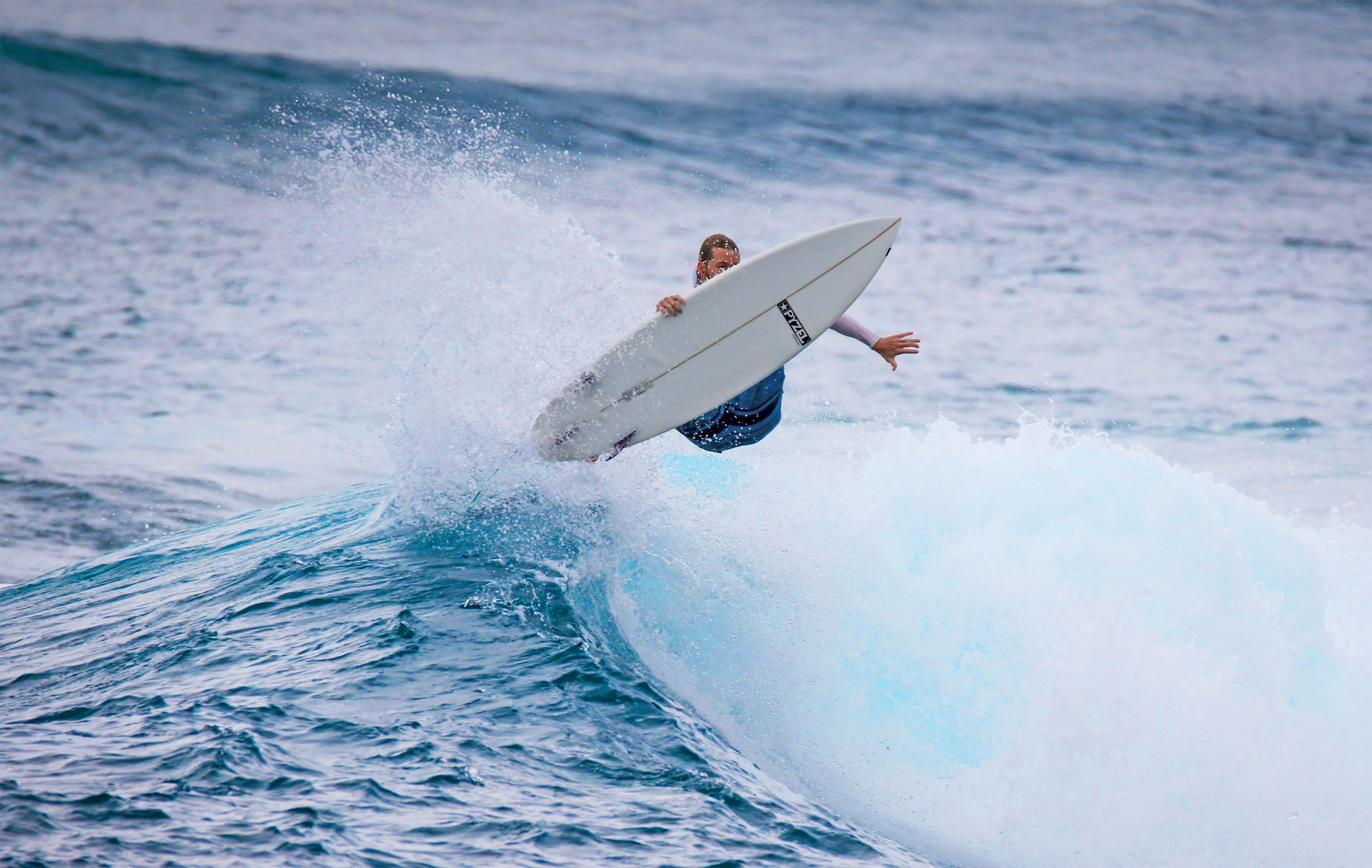 Harper Cullen surfing a wave